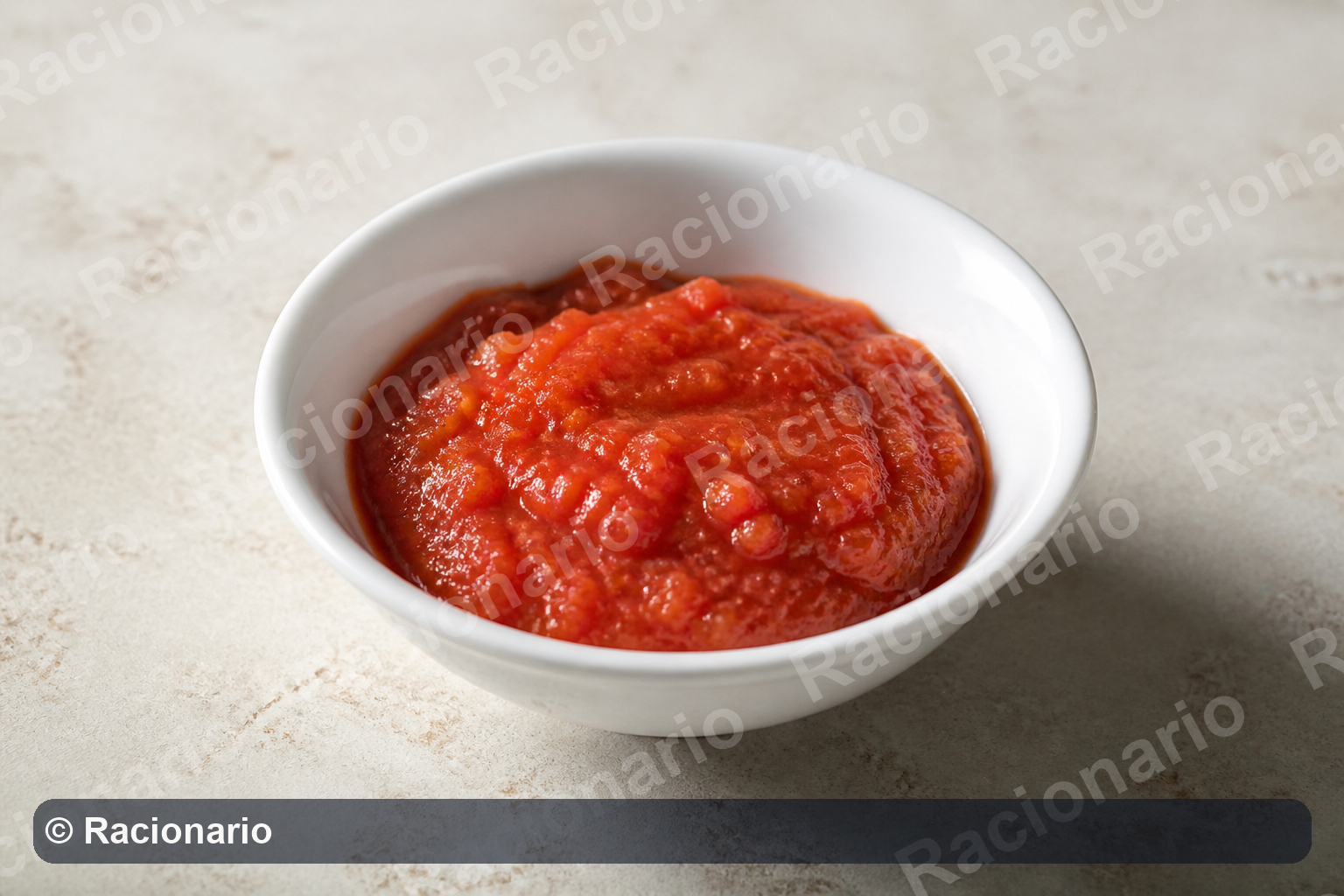 Ración de Salsa de tomate frito: Ración: media taza de café, 100 g